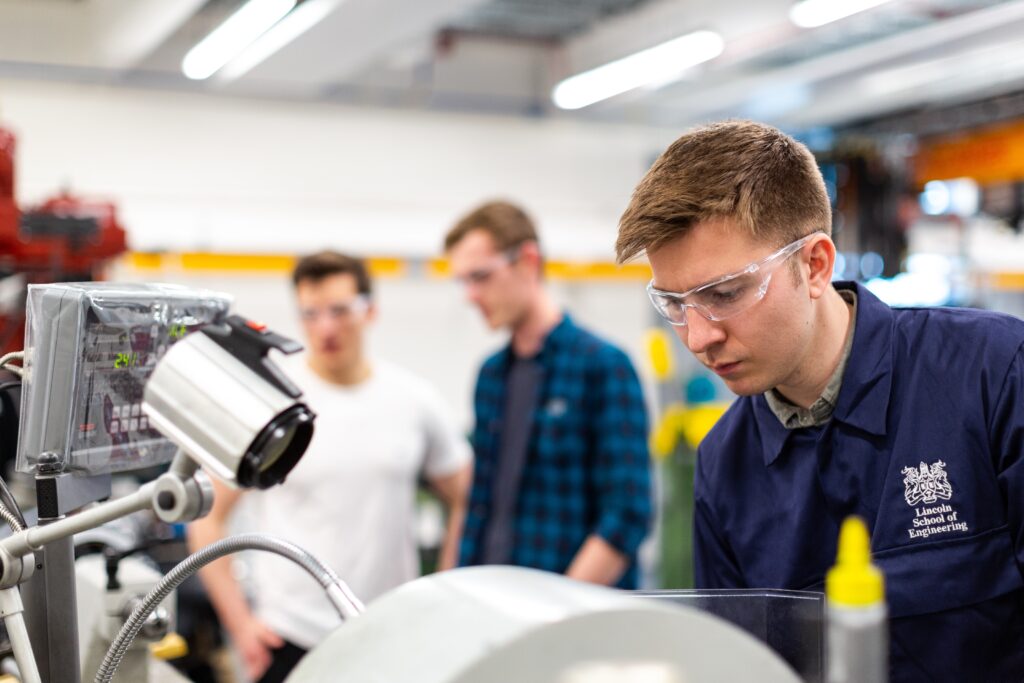Male engineer working on some machinery 