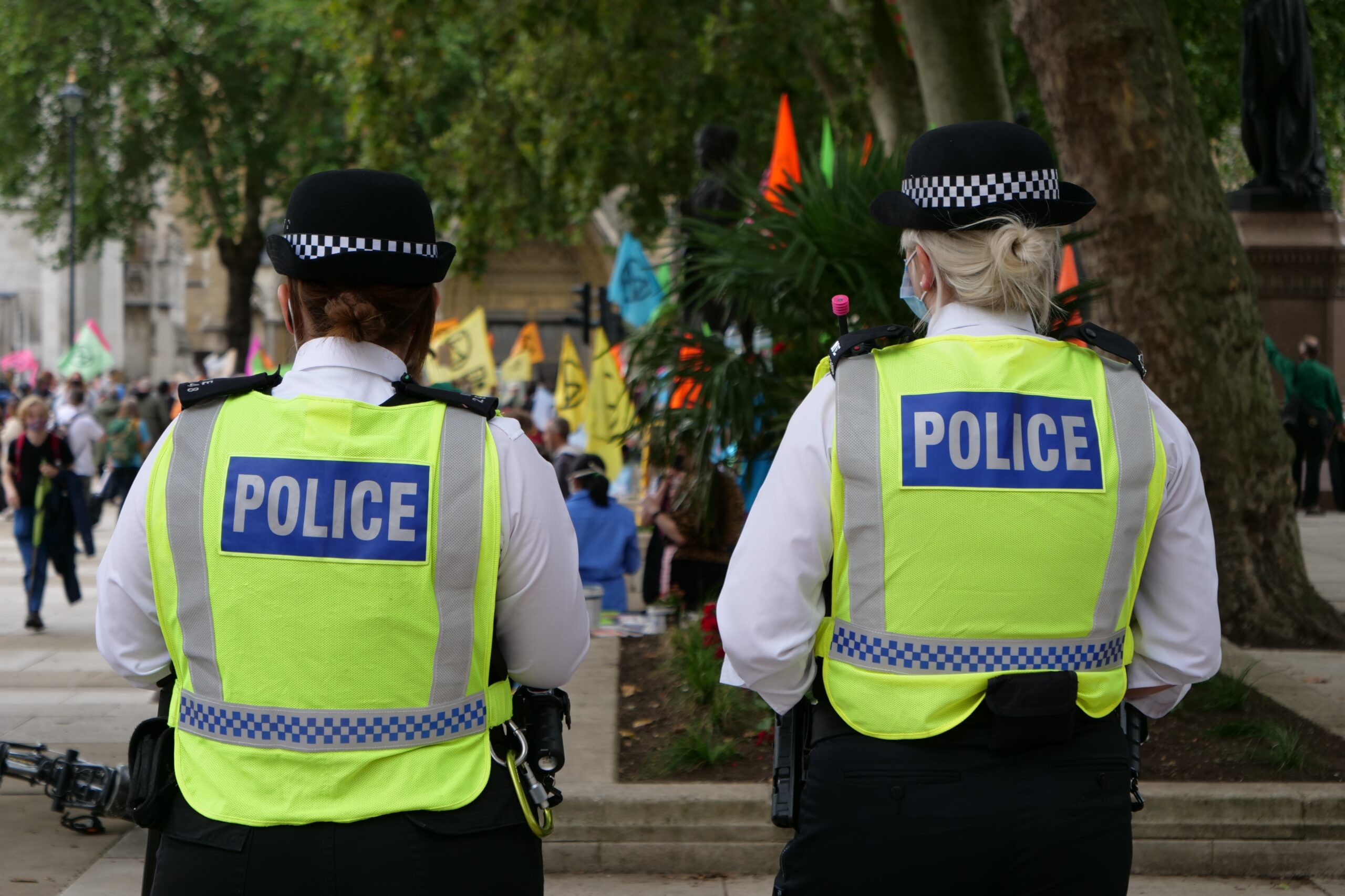 two police officers in masks for police constable apprenticeship article