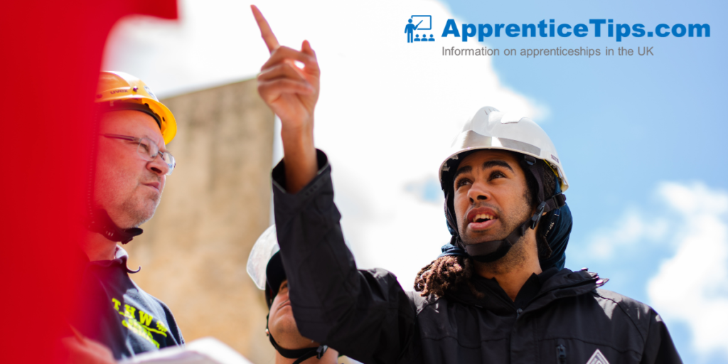 Male engineer in hard hat pointing