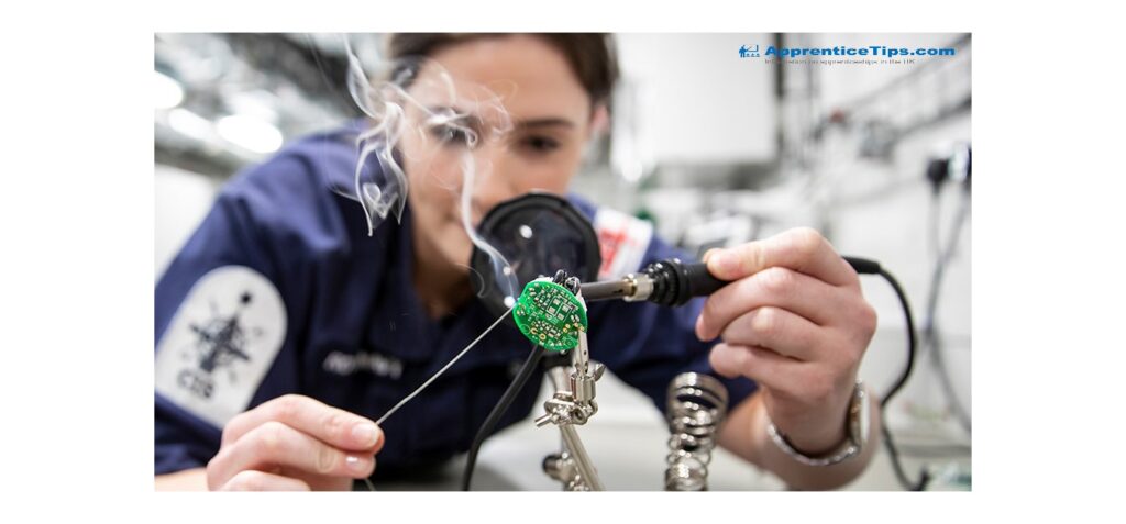 A Navy Engineer soldering to repair a small electrical issue.