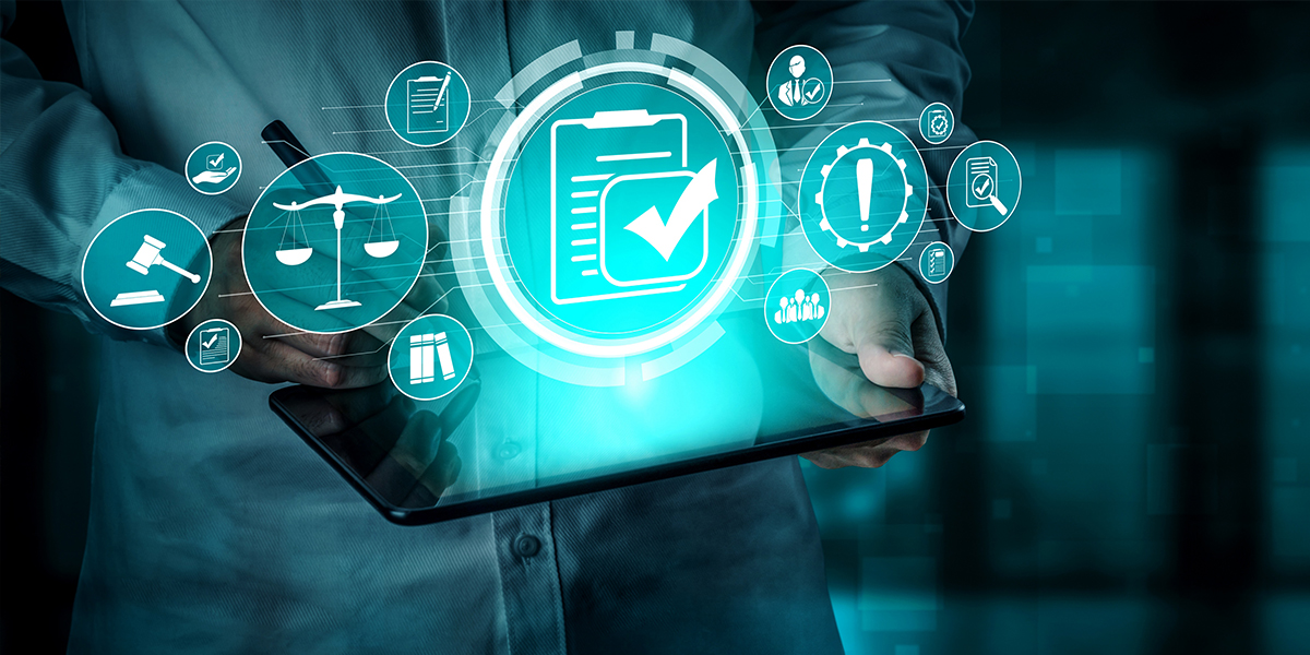 Compliance rule and law graphic coming out of a tablet.