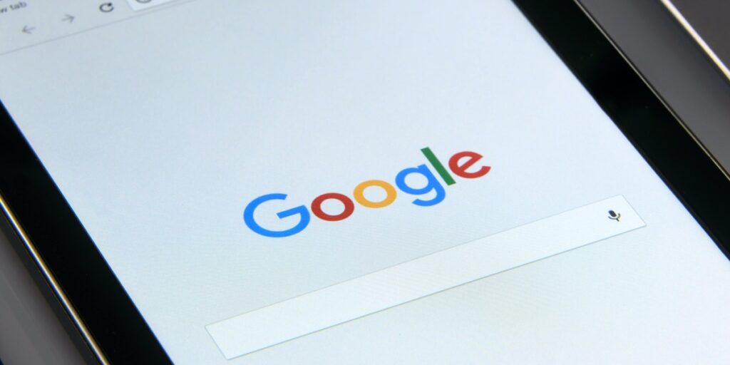 Black Samsung tablet display with the search engine Google on screen