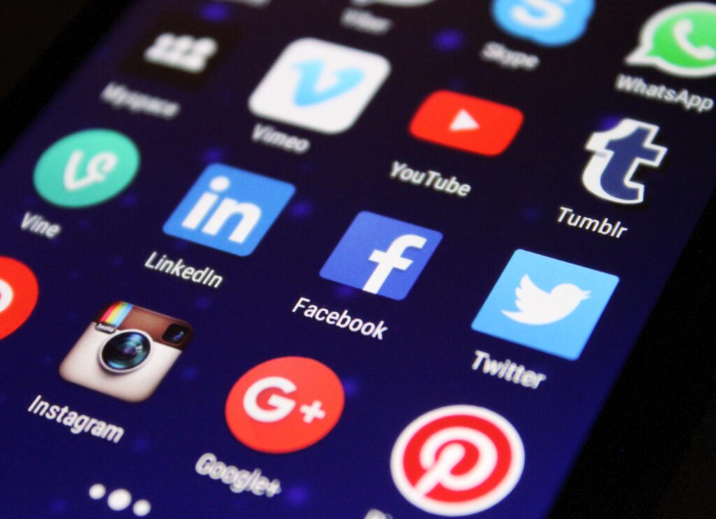 a mobile phone screen with various social media apps