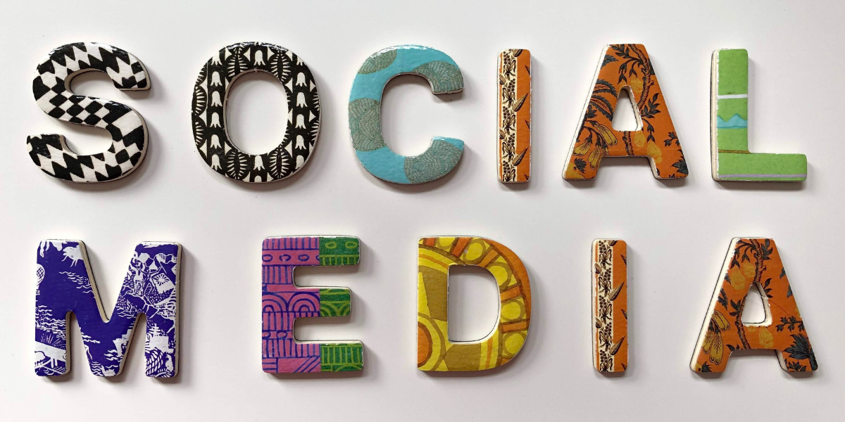 Patterned letters spelling out social media