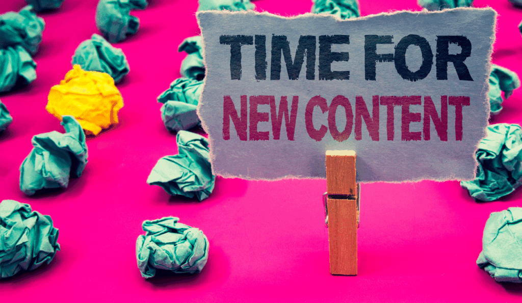 SEO techniques to boost your website's ranking - time for content on paper with pink back drop and screwed up paper balls 