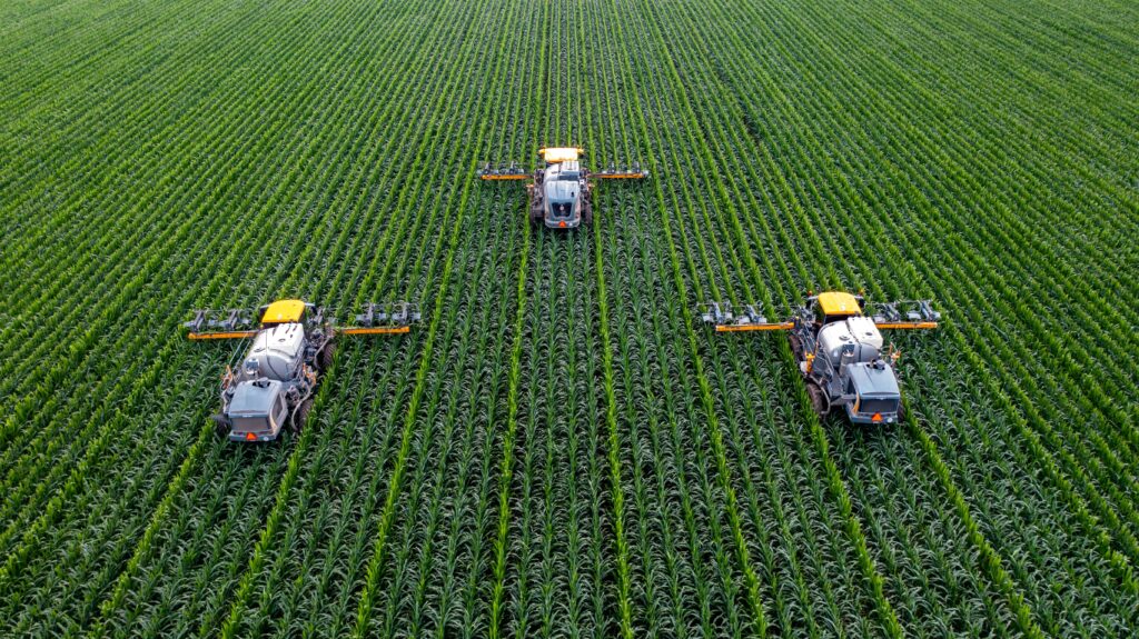 Agriculture or Horticulture apprentices will gain communication skills. image of three AI faming robots in a field tending to plants