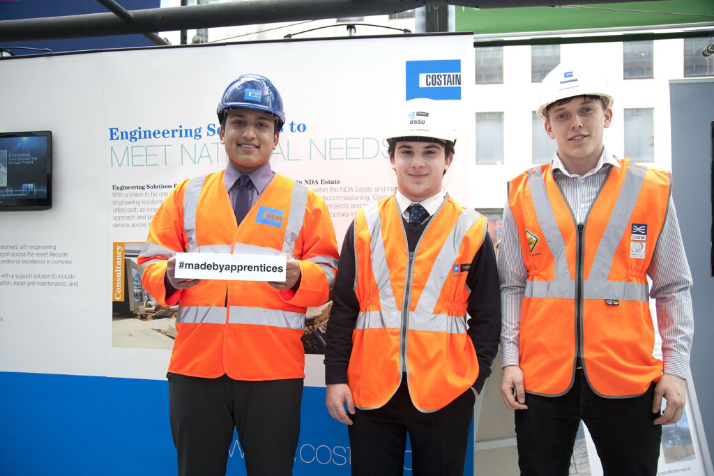 Three male Construction Site Engineering Technician Apprentices