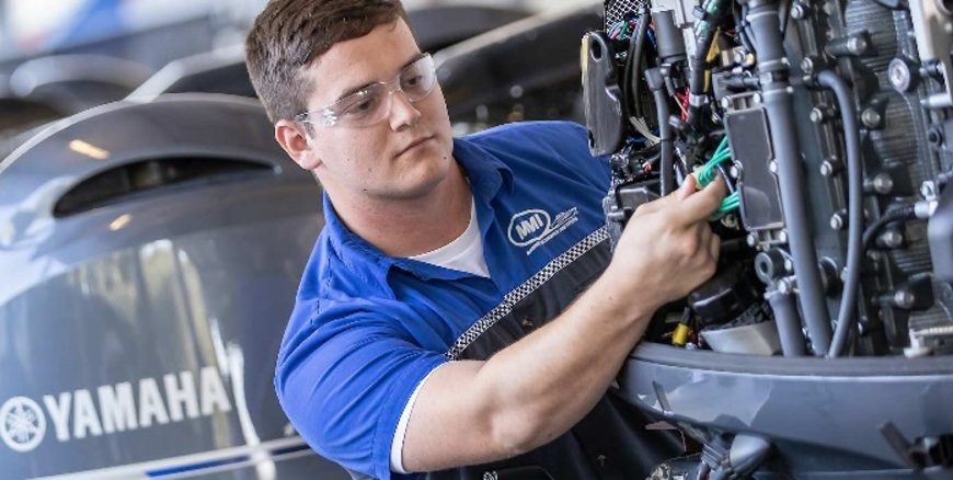 Mechanic undertaking maintenance of electrical equipment on ships. Image from Complete apprenticeship 
